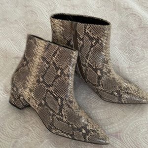 Snake skin booties worn just a few times. zipper on side. 1 1/2 “ heel